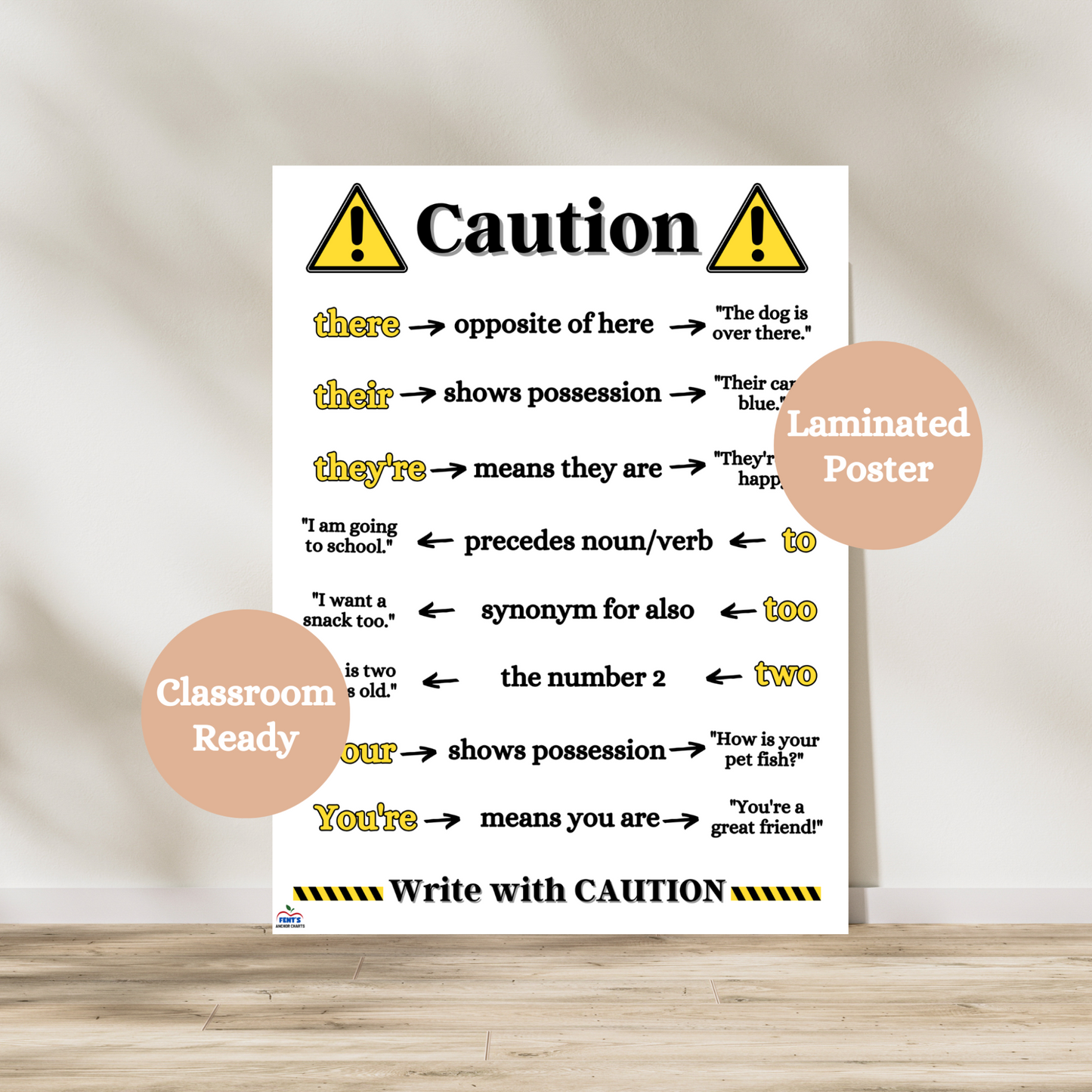 Laminated caution-themed anchor chart displaying commonly confused homophones like their/there/they’re and your/you’re, designed for elementary grammar instruction.